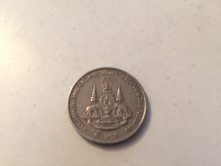 Asian-Coin-With-The-Same-Men-On-The-Obverse